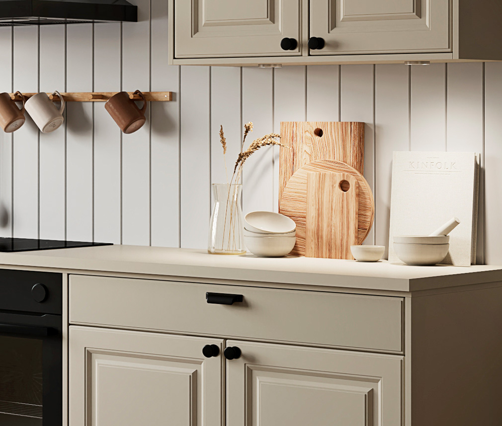 Detaljer från ett klassiskt kök med svarta knoppar och handtag Detaljer från ett klassiskt kök med svarta knoppar och handtag