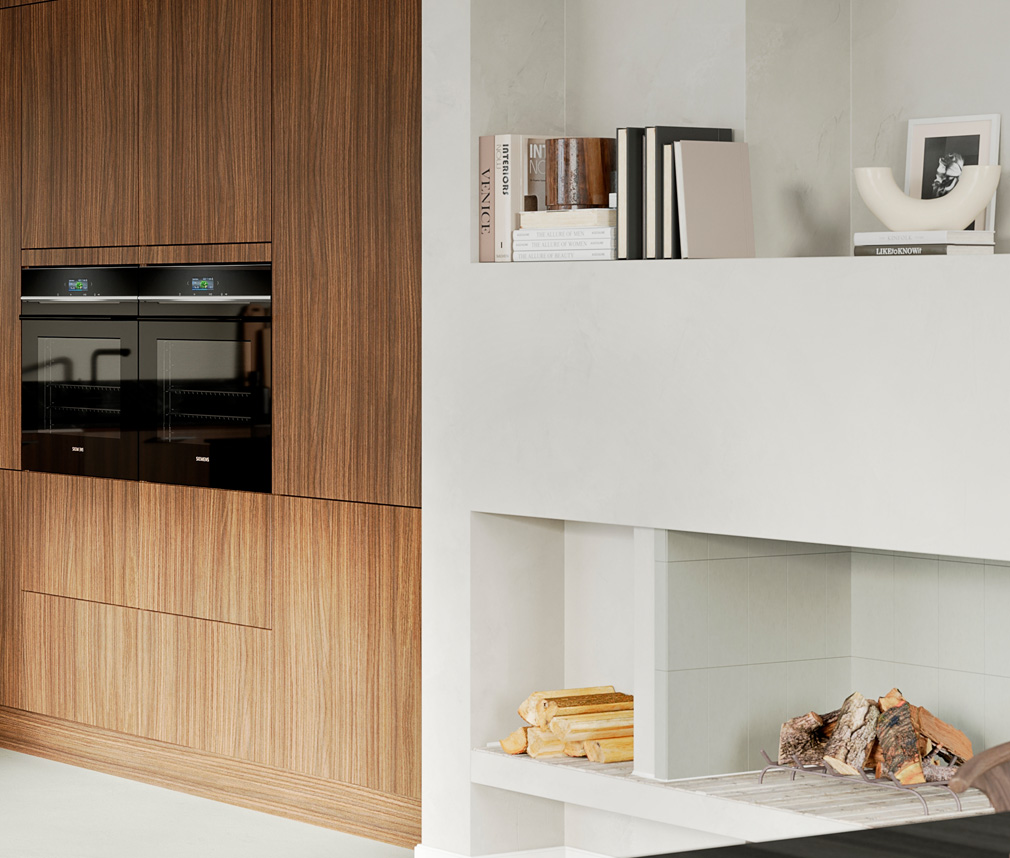 Modernt kök med valnötsluckor, svarta vitvaror och en vit platsbyggd bokhylla Modernt kök med valnötsluckor, svarta vitvaror och en vit platsbyggd bokhylla